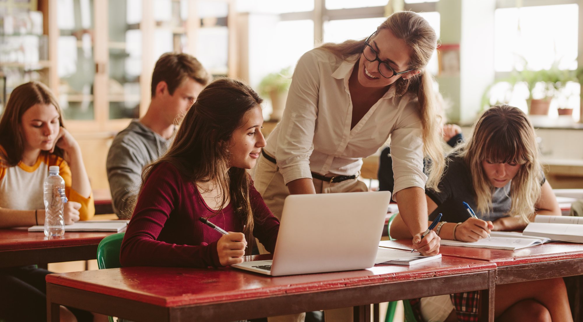 A Florida teacher reviewing FRS retirement planning options before leaving the classroom